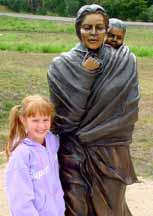 Katelyn with statue of Sacajawea and son